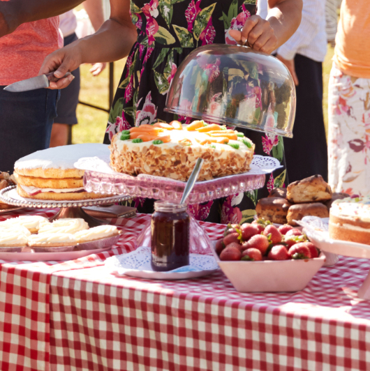 Busy Cake Stall At Summer Garden Fete Events